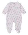 A baby footie with a pink teddy bear pattern and asymmetrical zipper closure.