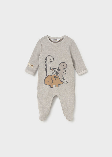 Gray footie with dinosaur graphic and snap closures, featuring long sleeves and a cozy design.