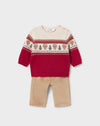 Infant red and cream sweater with reindeer pattern and beige corduroy pants.