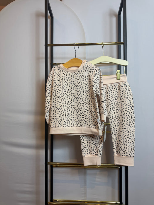 Baby two-piece set with leopard spot print in neutral colors, featuring a long sleeve top and matching pants.