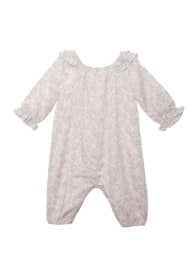 A soft pink romper with a floral print, featuring long sleeves and ruffle details.