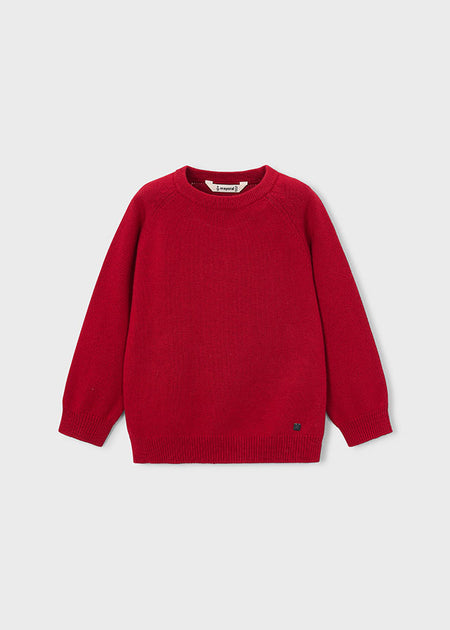 Children's red knit sweater with a crewneck and long sleeves.