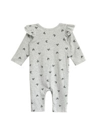 Gray romper with heart pattern, long sleeves, and ruffle detail on shoulders.